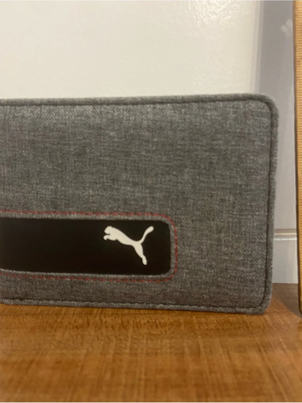 Puma Gray wallet with Red Stitching and Black Logo Patch